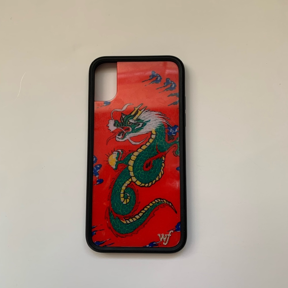 Used iPhone XS Wildflower phone case. In great condition, only a few scratches.